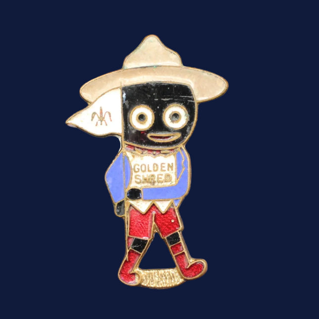 Pin with a character wearing a hat and a sign on a blue background