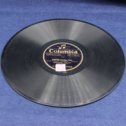 Vintage Columbia record on a blue surface