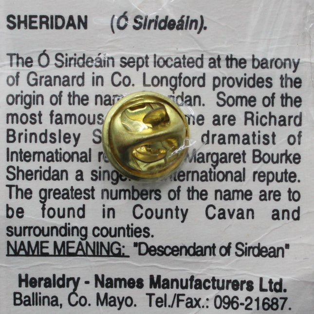 Gold button with a label on a dark blue background