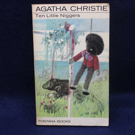Book cover of 'Ten Little Niggers' by Agatha Christie with a illustration of a child and dog on a blue background