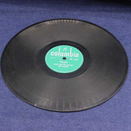 Vinyl record with a Columbia label on a blue surface