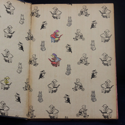 Illustrated book with black and white drawings of children and animals on a beige background.